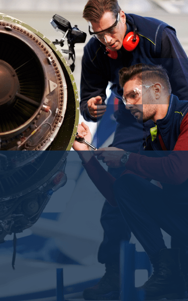 A man repairing an airplane engine